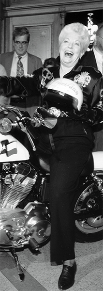 Ann Richards on a motorcycle