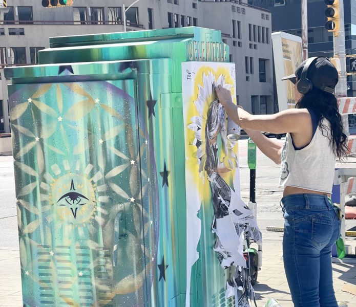 Niz, an austin artist, working on her ARTBOX is republic square, sponsored by the downtown austin alliance foundation